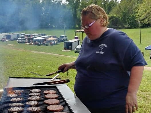 Secretary Candyce Hilgenberg grills up some burgers and hot dogs at our food pavilion at the Anne Arundel County Fairgrounds